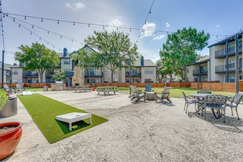 Outdoor courtyard with seating and fire pit